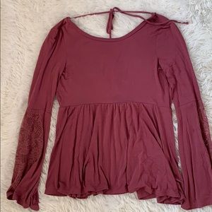 High neck, open back blouse